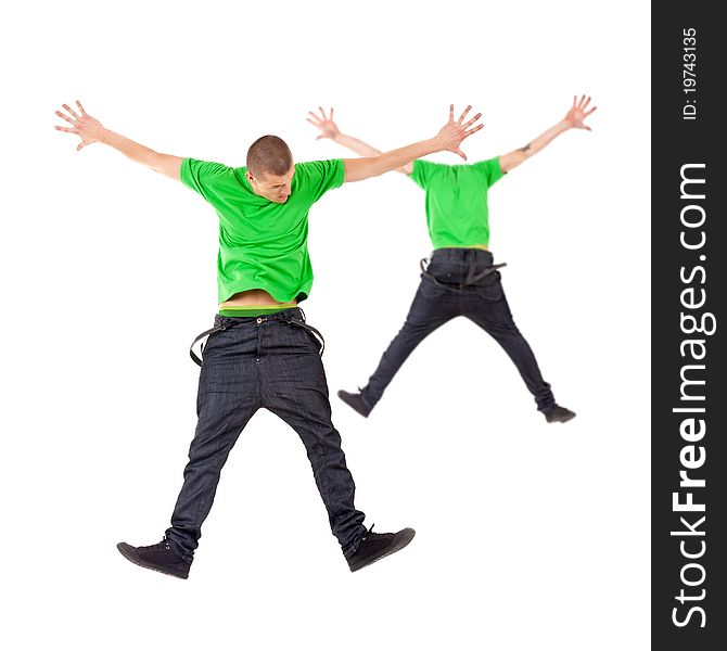 Two male break dancers jumping on studio background