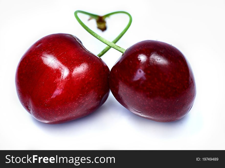 Fresh cherries isolated on a white background