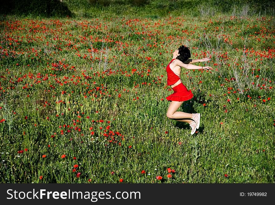 Jumping In Poppies Fields
