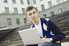 Young Student Working On A Laptop Stock Photos