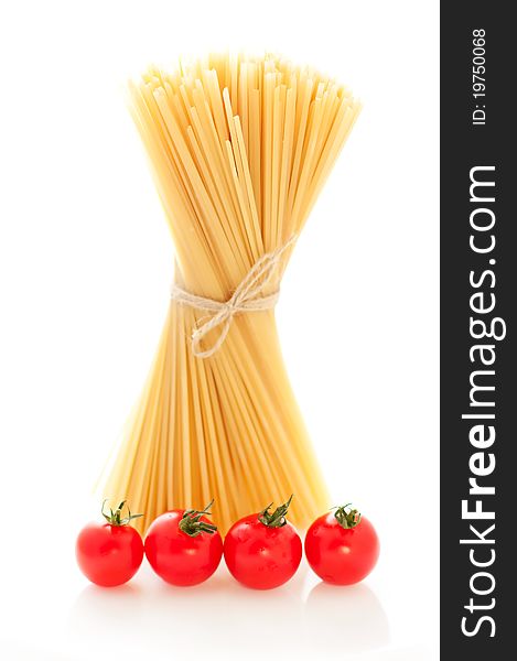 Spaghetti and tomato over white