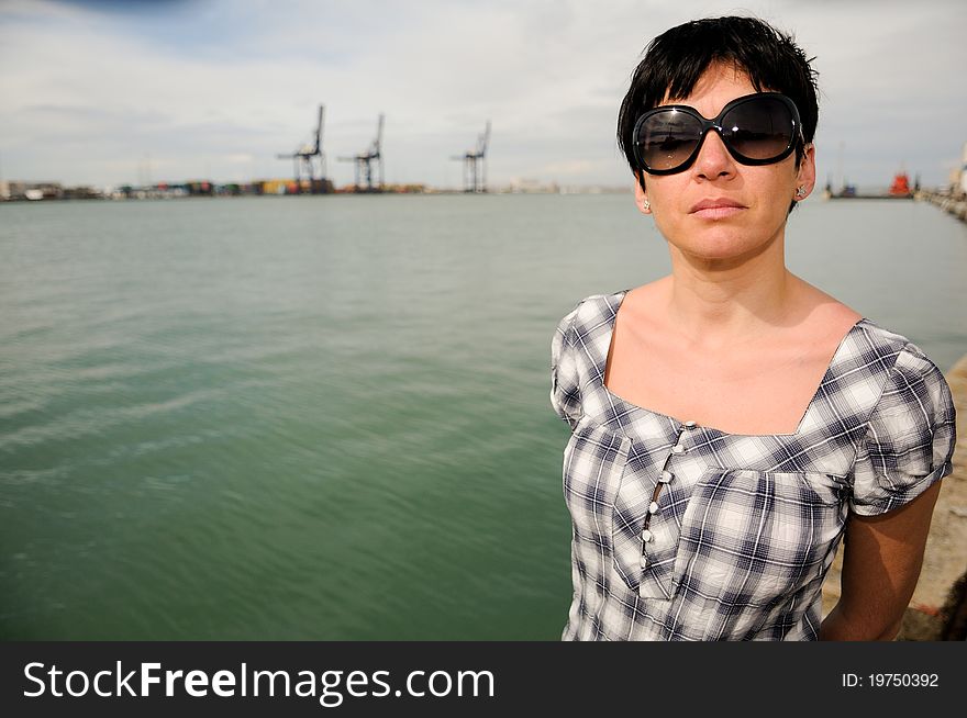 Woman with sunglasses in CÃ¡diz, Andalusia, Spain. Woman with sunglasses in CÃ¡diz, Andalusia, Spain