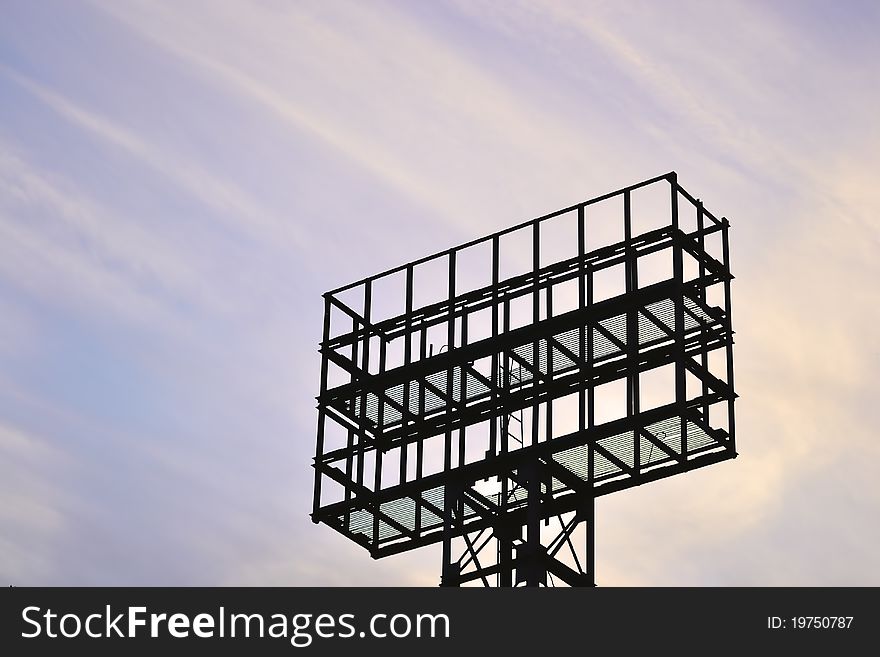 A Metal construction on cloudy sky background