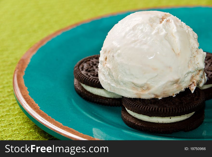 Ice Cream with Cookies on a Blue Plate