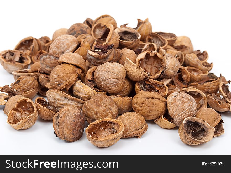 Walnut shell on white background