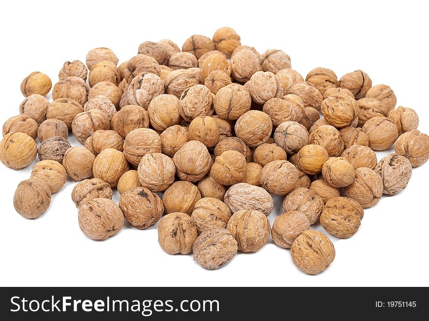 Ripe Walnut on white background