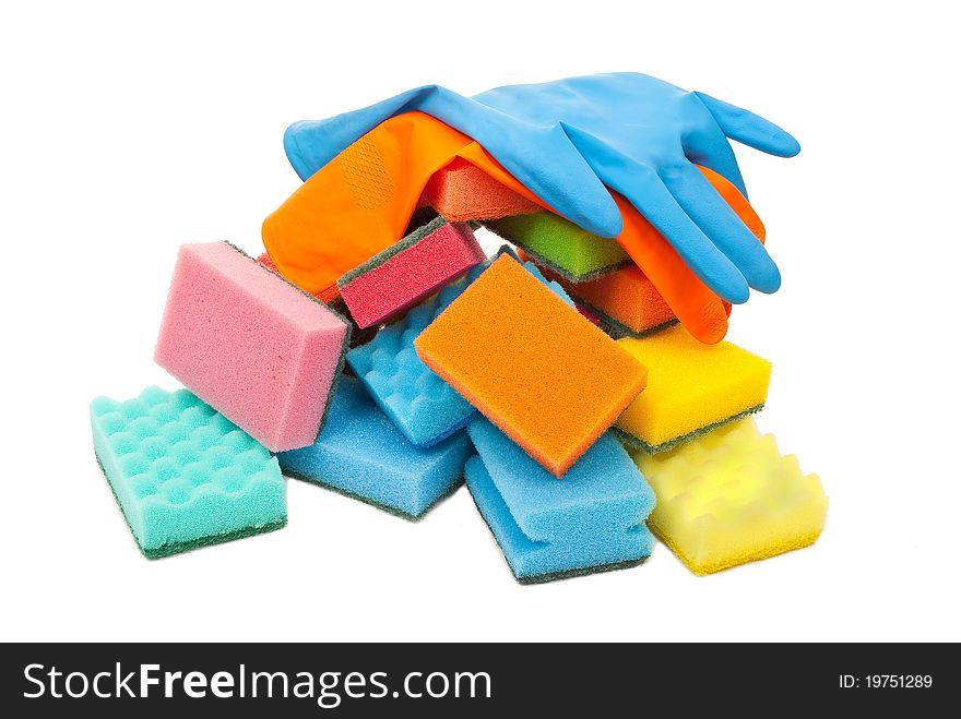 Rubber gloves and kitchen sponges on white