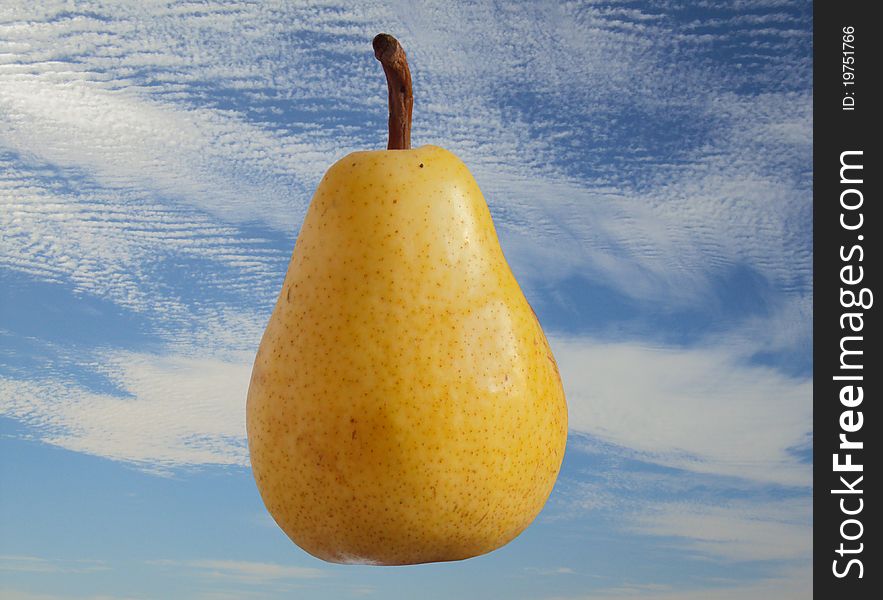 Pear floating with the sky as background. Pear floating with the sky as background