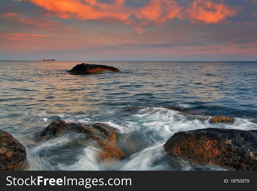 Sunset on the rocky coast