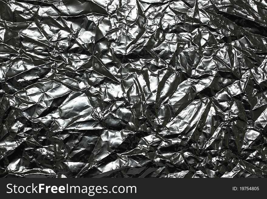 Foil background and texture silver paper with wrinkled