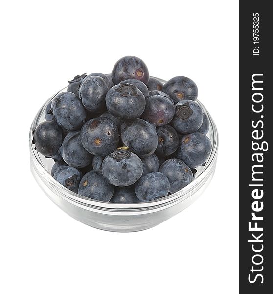 A bowl of fresh blueberries, isolated on a white background. A bowl of fresh blueberries, isolated on a white background