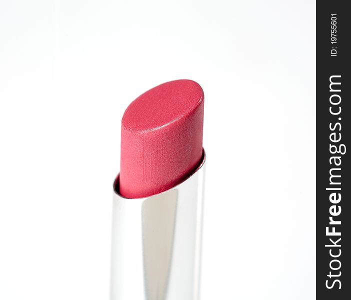 Pink lipstick on white background