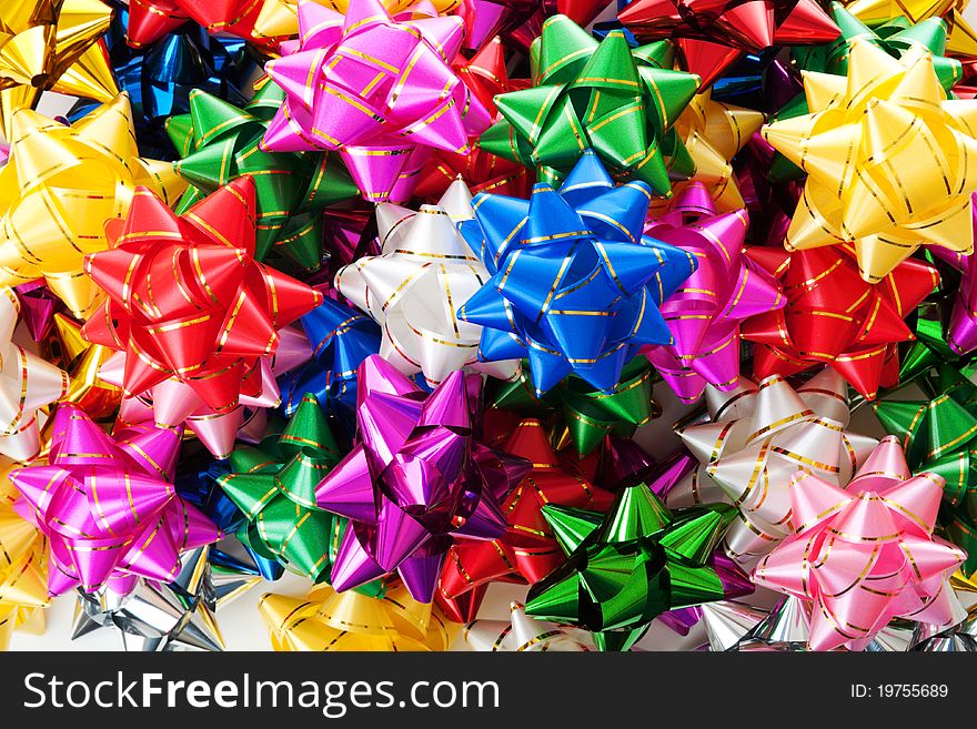 Large heap of colorful decorative bows. Large heap of colorful decorative bows