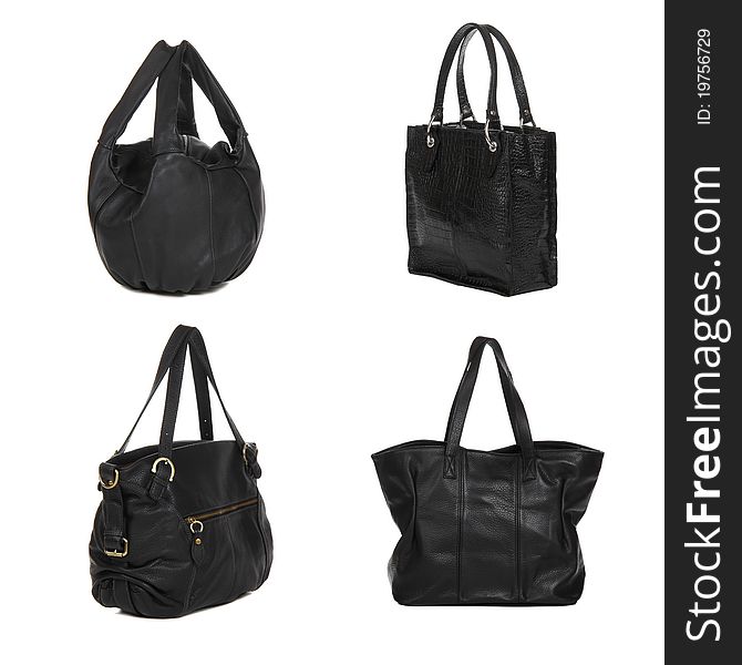 Set of black leather female bags isolated on white