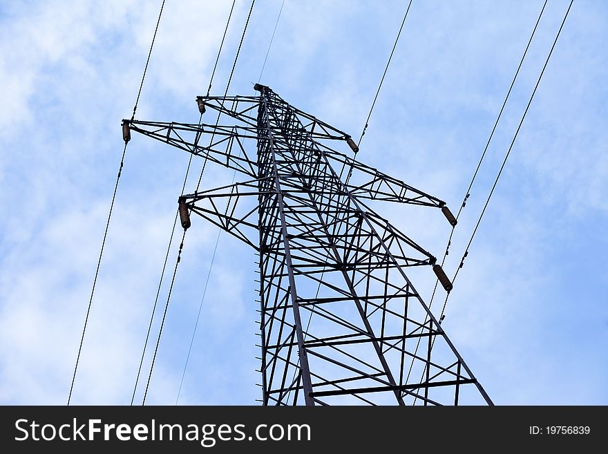 Transmission power line on sky background