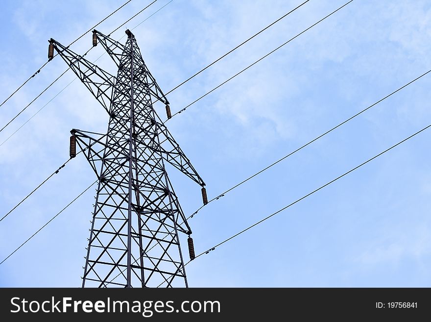 Transmission power line on sky background