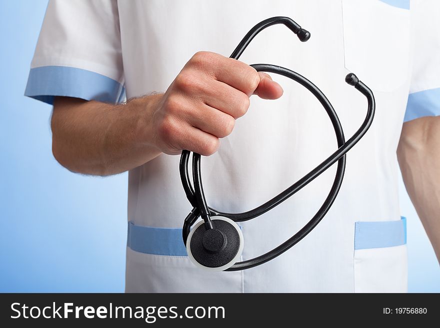 Stethoscope in hands of medical doctor. Stethoscope in hands of medical doctor