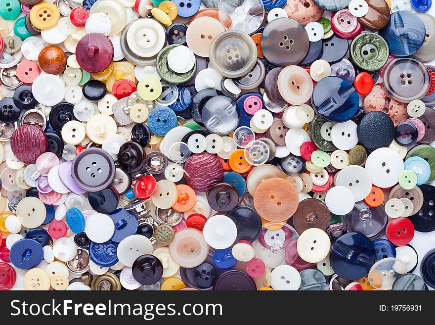 Colorful sewing buttons textured background. Colorful sewing buttons textured background