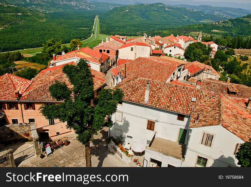 Hill top town in Croatia showing red roofs of old buildings