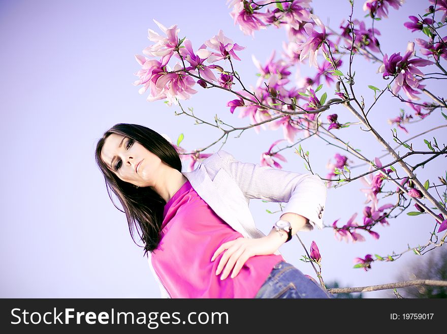 Fashionable Girl and  purple flowers