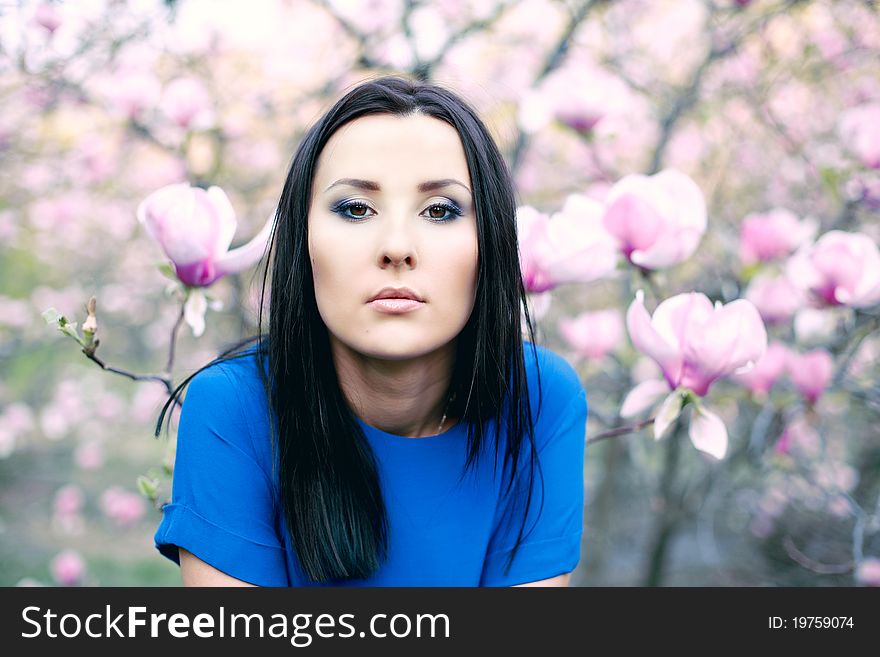 Girl And Magnolia Flowers