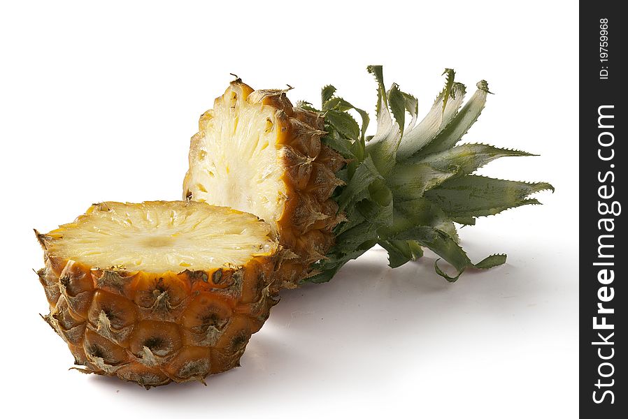Cut off pineapple on the white background