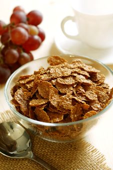 Chocolate Muesli In Bowl And Grapes Stock Images