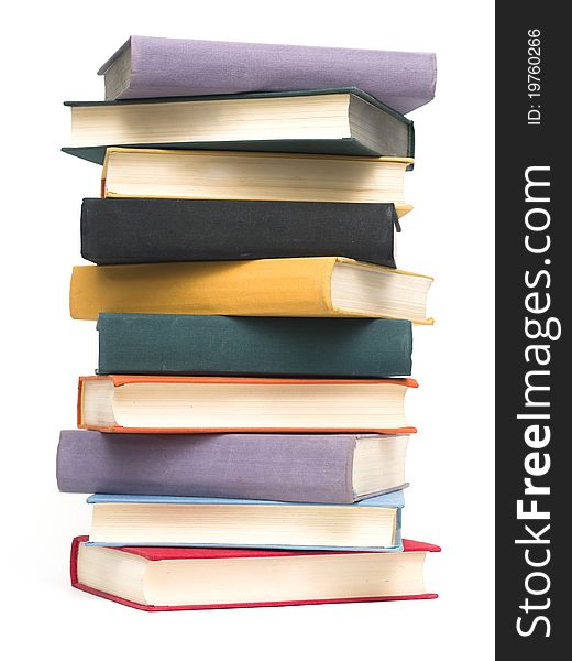 Stacked old books on white background