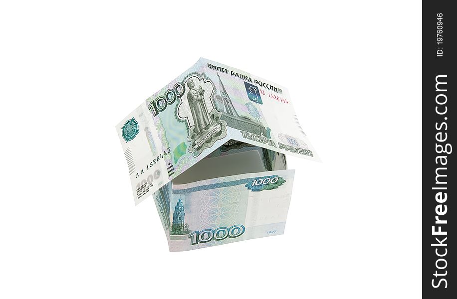 Money in the form of house on a white background