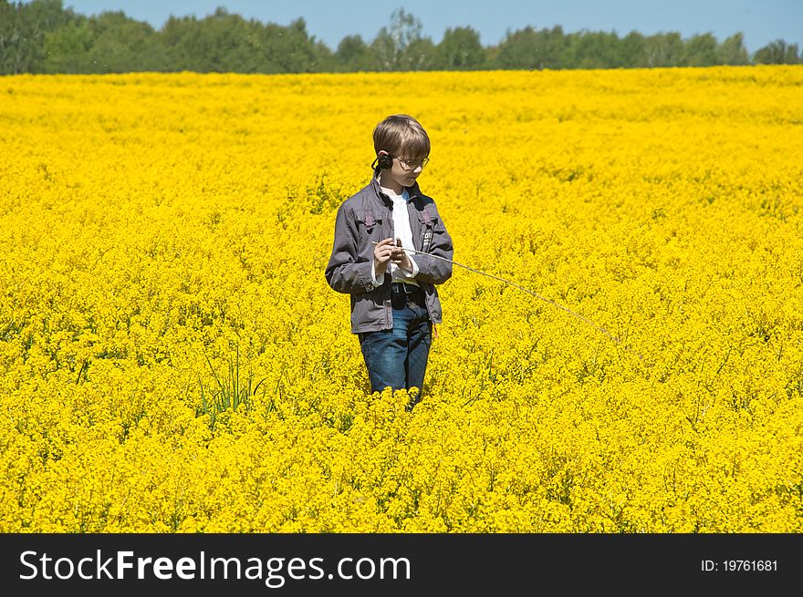 Young boy on yellow field. Young boy on yellow field