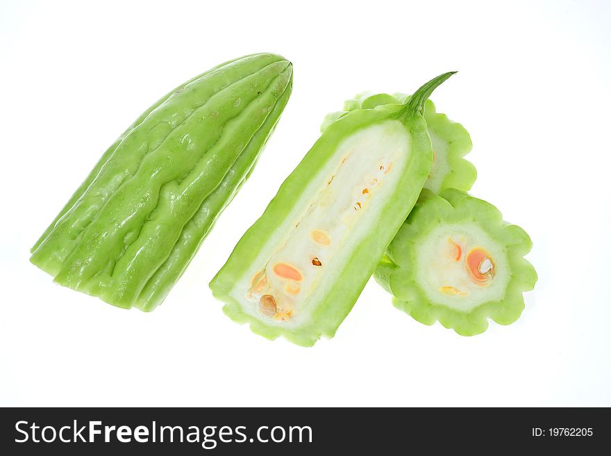 Bitter Gourd With Sectional Cut Showing The Seeds Within. Bitter Gourd With Sectional Cut Showing The Seeds Within