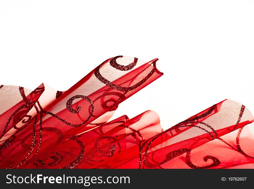 Sparkly, red textured gauze background against white with sparkle swirls and twirls. Sparkly, red textured gauze background against white with sparkle swirls and twirls.