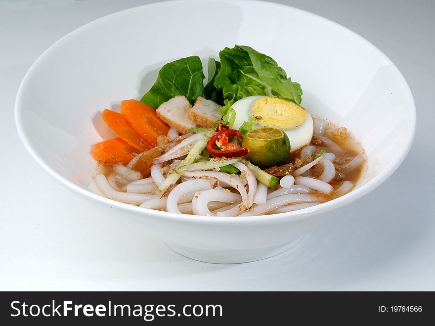 Malaysian Malay traditional spicy gravy noodle. Malaysian Malay traditional spicy gravy noodle