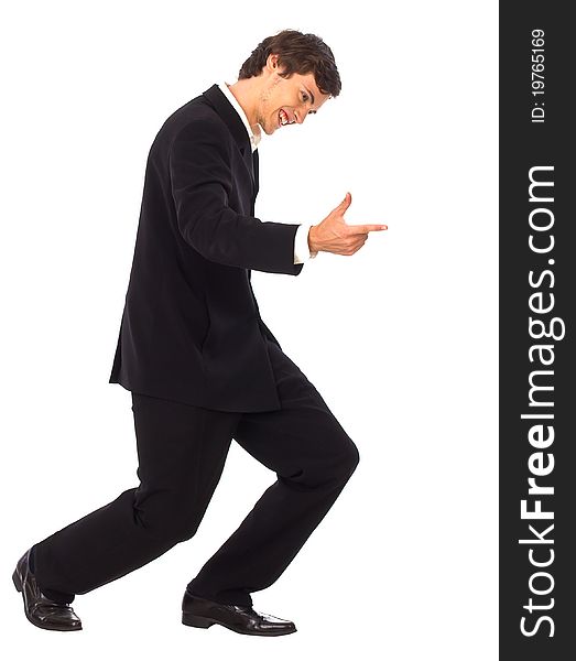 Successful businessman pointing to the right standing on white background