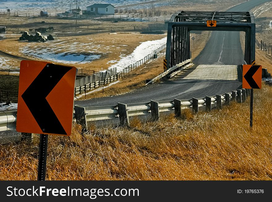 Bridge on the Alberta plains early spring, after the snow melt.