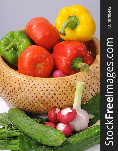 Vegetables - a vegetarian dinner in a basket. Vegetables - a vegetarian dinner in a basket.