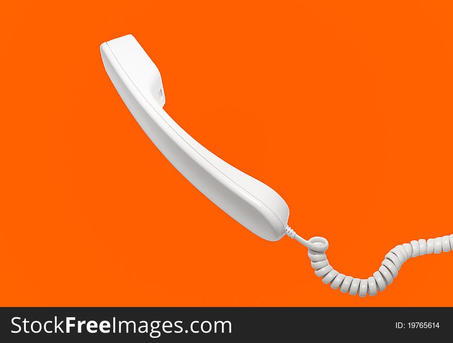 Handset with a wire on an orange background