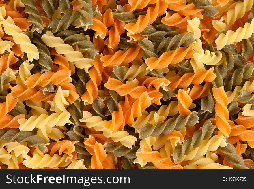 Background of colorful pasta closeup