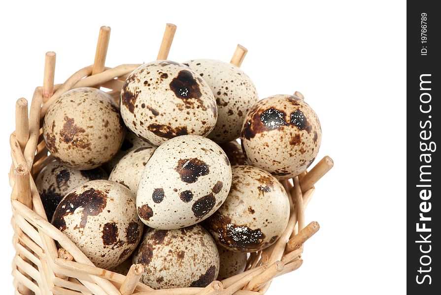 Quail eggs isolated on white