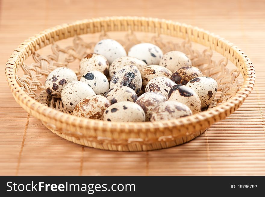 Fresh Quail eggs in the basket