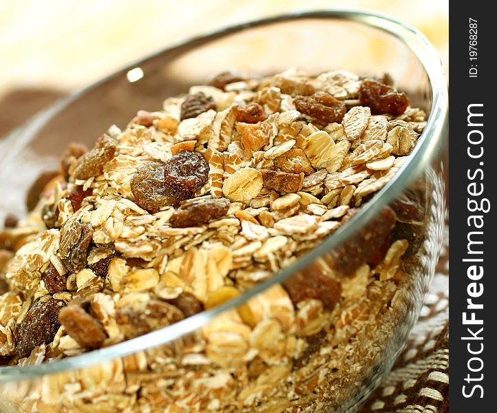 Muesli of oats with raisin in bowl