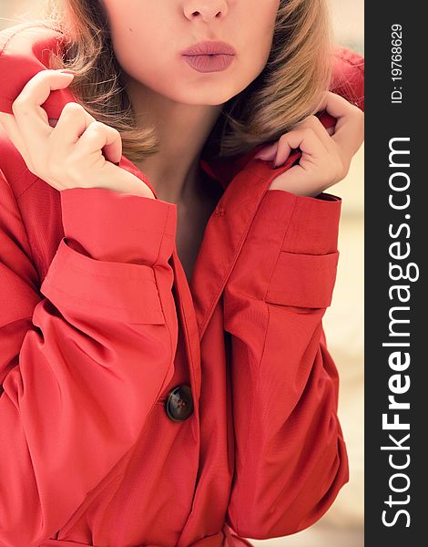 Young Girl In A Raincoat Closeup (selective Focus)