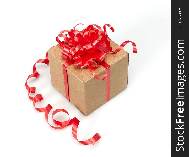 Gift Box whits red ribbon isolated on white