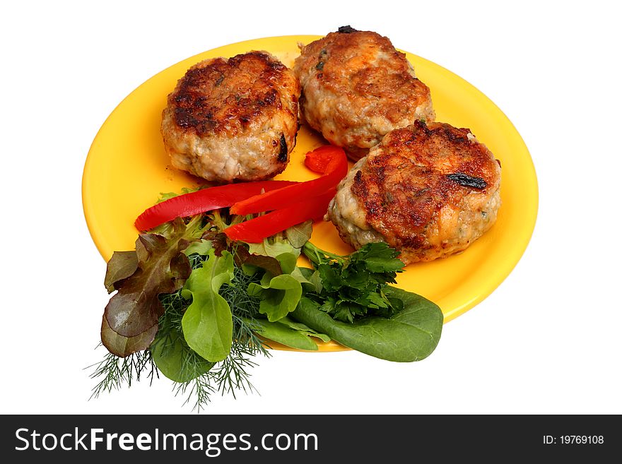Three Burgers with vegetables on a yellow plate