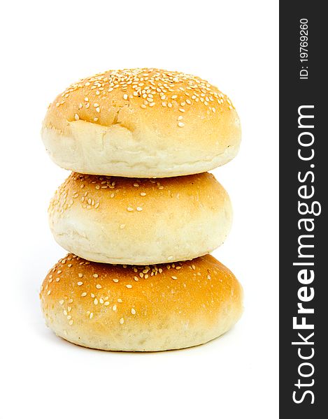 An image of three fresh buns on white background