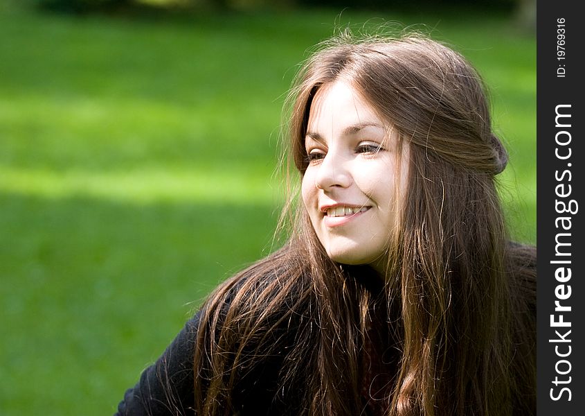 Bright girl in park