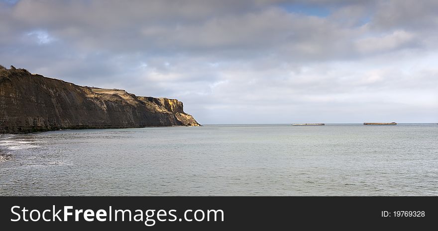 Famous coastline in Normady, France, panorama. Gold beach. Famous coastline in Normady, France, panorama. Gold beach.