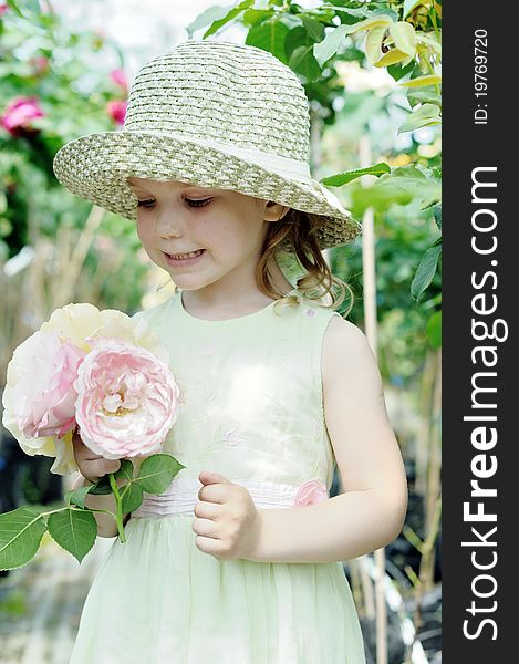 An image of a little girl with big roses