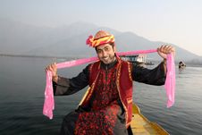 Indian Man Dancing To Folk Song With Pink Shawl Stock Photos