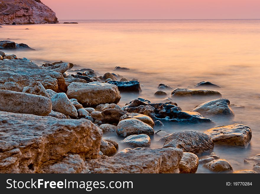 Sea decline, coast with the big stones